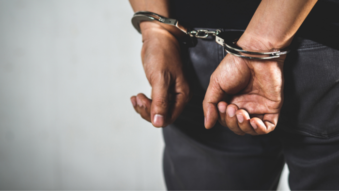 Person in handcuffs