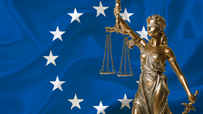 EU flag with scales of justice