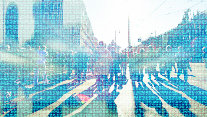 People on street with numbers in front